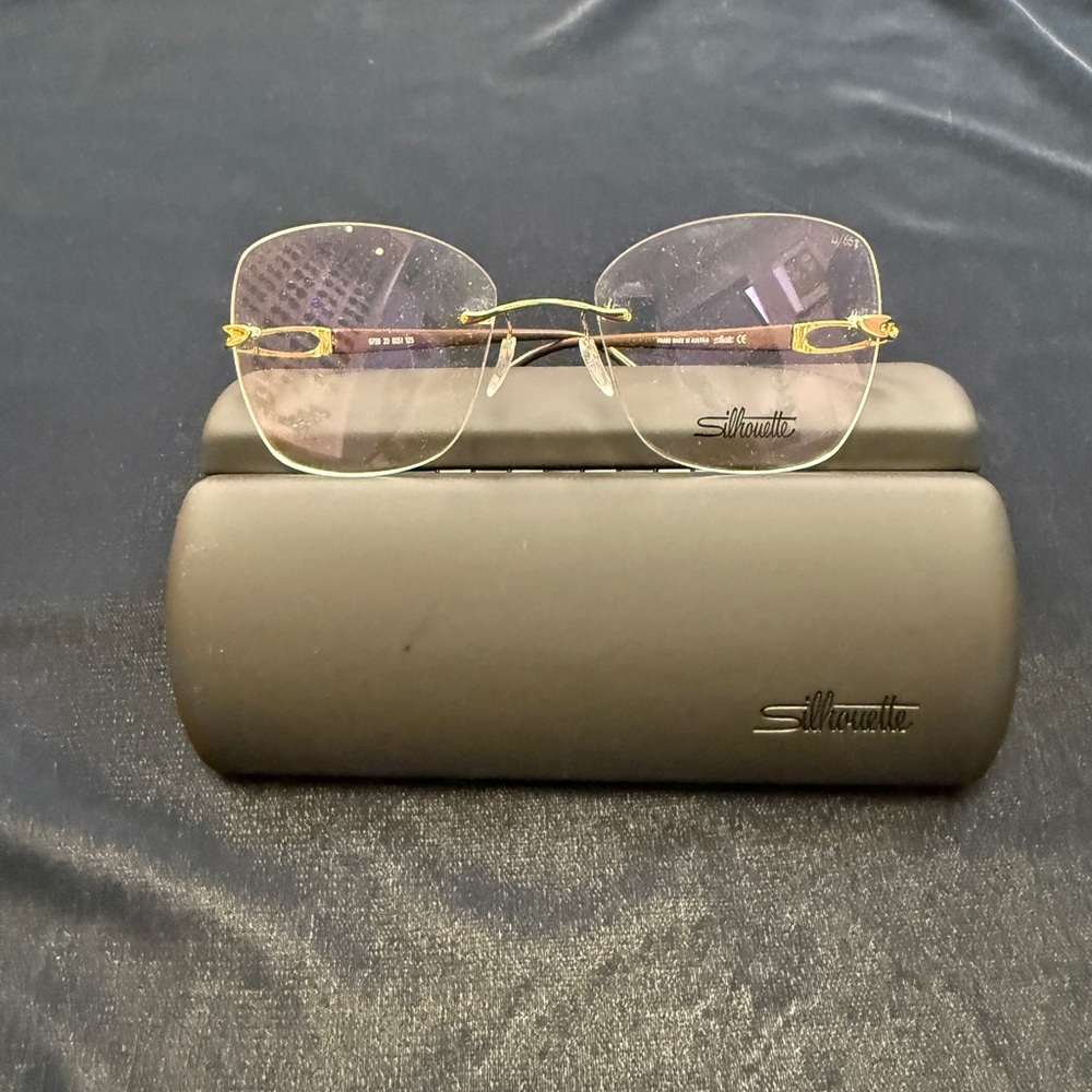 Silhouette Eyeglass Frame Infinito 6708, color 6051 20 bridge Demo Lens Shape LI